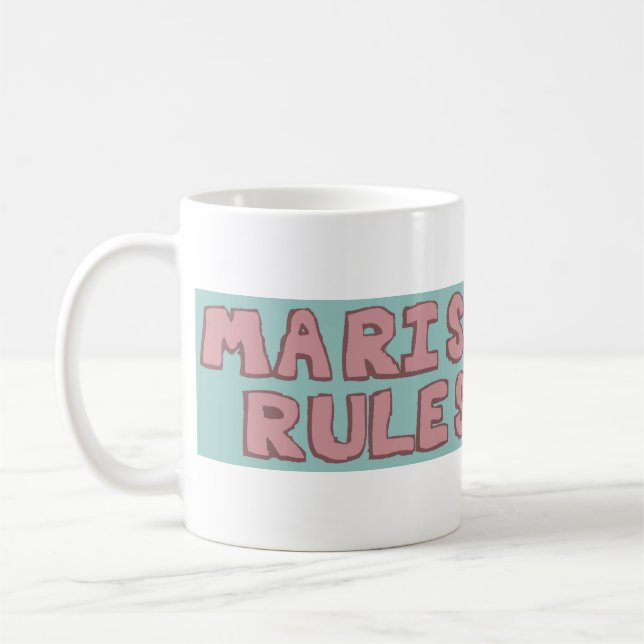 Marisa ordena a caneca de café - viva por suas (Esquerda)
