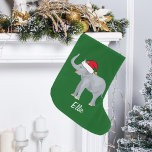 Meia De Natal Grande Elefante de Natal<br><div class="desc">Esta bela estocagem de elefantes de Natal mostra um lindo elefante sorridente vestindo um chapéu vermelho de Papai Noel com um tronco elevado. Esta bonito estocagem personalizada de Natal de animais é decorada com uma adorável experiência de férias verdes. Personalize com seu próprio texto na base para um presente elegante....</div>