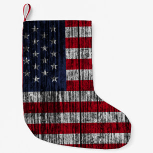 Meia De Natal Pequena Bandeira americana pintada sobre fundo de cerca.4º