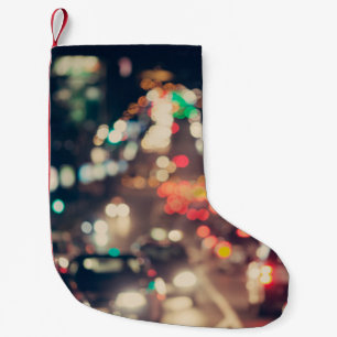 Meia De Natal Pequena Cidade Noturna: Luzes Desfocadas Retro.