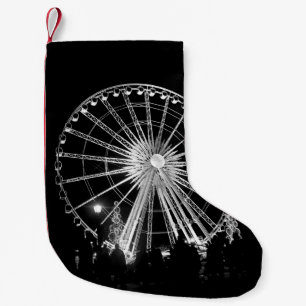 MEIA DE NATAL PEQUENA PESSOAS PERTO DA RODA FERRIS