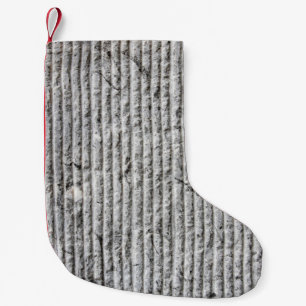 Meia De Natal Pequena Textura na parede da cinza. Textura da parede de p