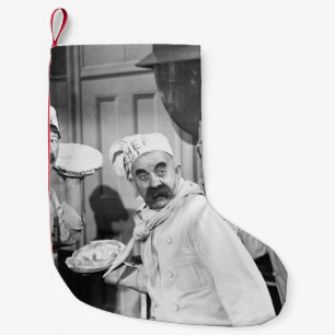 Meia De Natal Pequena Três chefs segurando tortas para lutar na cozinha