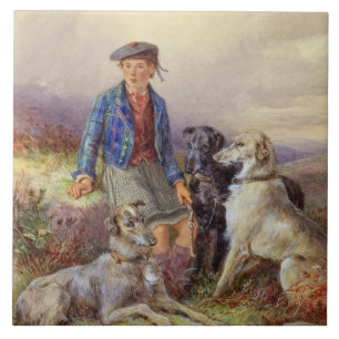 Menino escocês com wolfhounds em um landsca das