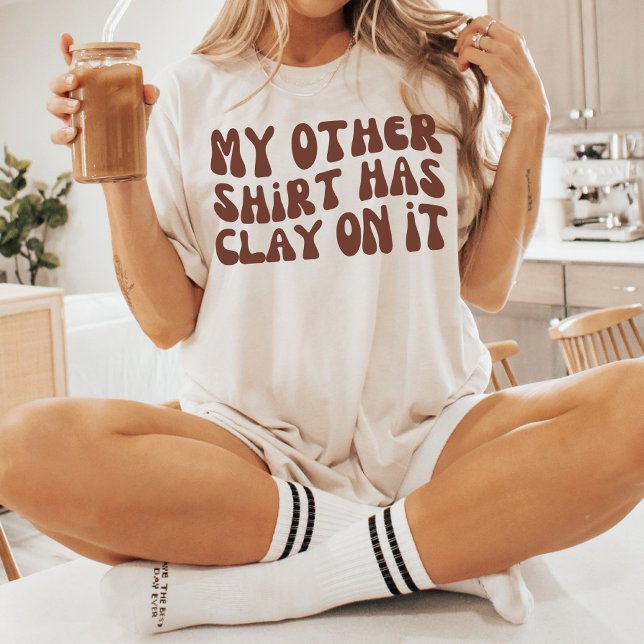 Minha outra camisa tem argila nele, cerâmica de po (Criador carregado)