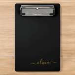 Mini Prancheta Nome do Monograma Rapariga de Script Moderno Doura<br><div class="desc">Área de Transferência de Planejamento de Nome Preto e Dourado. Isto faz o doce e perfeito aniversário de 16 anos,  casamento,  chá de panela,  aniversário,  chá de fraldas ou festa de solteira presente para alguém que ama luxo de luxo e estilos quíticos.</div>