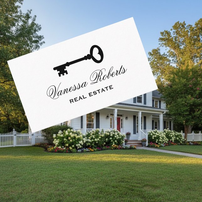 Modelo de cartão de negócios de chave do esqueleto (real estate business card template with key logo)