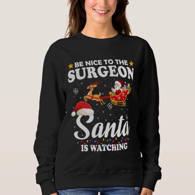 Moletom Be Nice To The Surgeon Santa Watching Xmas (Frente)