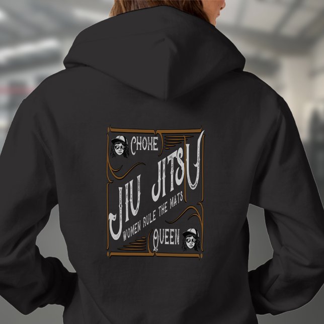 Moletom BJJ Retro Choke Queen Jiu Jitsu (Rear print Choke Queen black woman's hoodie worn by a female model in the gym.)