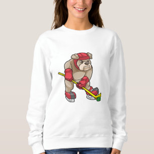 Moletom Buldogue no hóquei no gelo com bastão de hóquei no