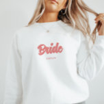 Moletom Chuveiro de Noiva 'Noiva' Rosa Personalizado Despe<br><div class="desc">Camisola de Chuveiro de Noiva 'Noiva' Rosa Personalizada. Personalize esta camisola de noiva minimalista e elegante com o nome da noiva sob 'noiva' em letras cursivas rosa. É um item perfeito para uma despedida de solteira ou chuveiro de noiva.</div>