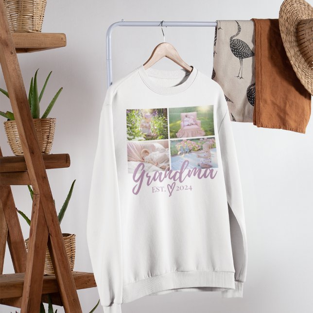 Moletom Colagem de Fotografias de Vovó Púrpura (White sweatshirt with a photo collage and "Grandma EST. 2024" in purple font, displayed on a hanger )