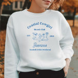 Moletom Cowgirl costeira Blue Ocean Bachelorette fim de se<br><div class="desc">Vire-se para uma cesta de solteiro que combina o charme da costa com o apelo robusto do Oeste Selvagem! Esta t-shirt do Coastal Cowboy apresenta uma mistura divertida de elementos da praia e do cowboy.</div>