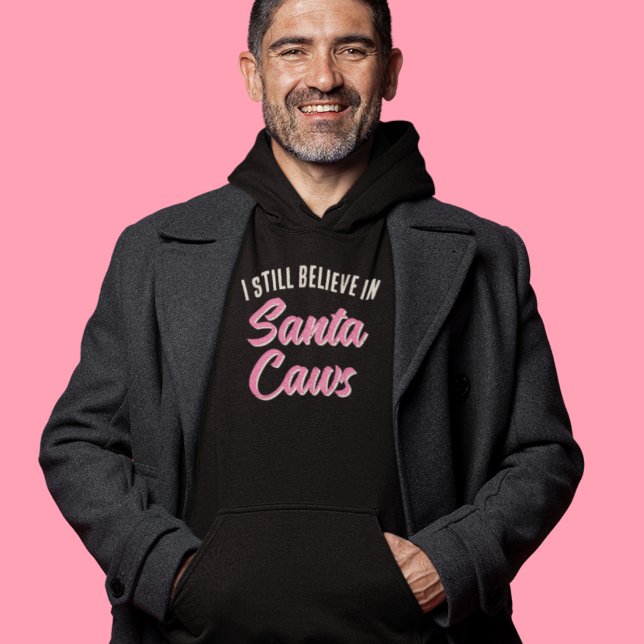 Moletom Engraçado Eu acredito em Papais noeis. (Stay warm and stylish with this funny winter "I believe in Santa Caws" black Christmas hoodie!)