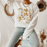 Folhas de queda e camisola de abóbora
