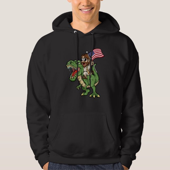 Moletom Jesus Riding A Tyrannosaurus Rex Dinosaur USA Flag (Frente)