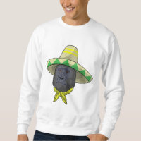 Macaco com chapéu de palha