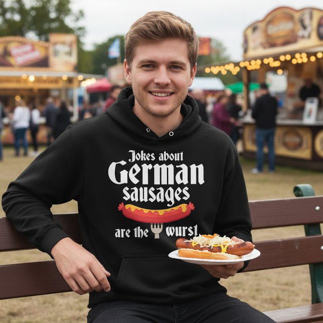 Moletom Salsichas Alemãs (Jokes about German sausages are the wurst black hoodie, man at a food festival in Germany)