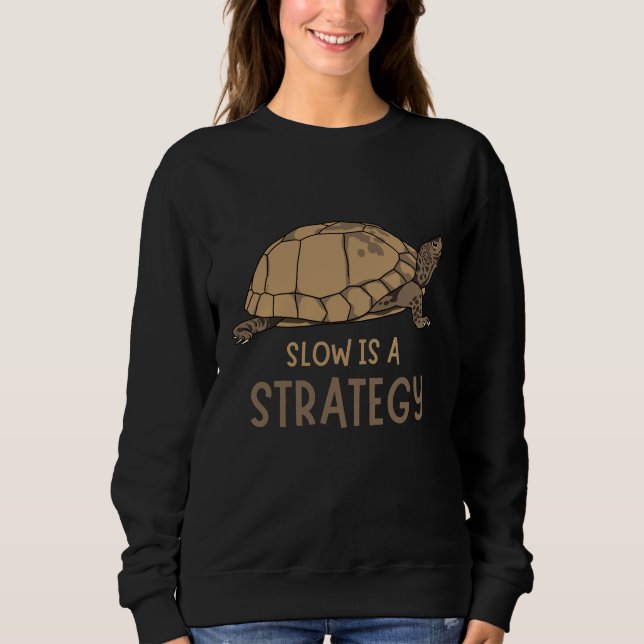 Moletom Slow Is a Strategy – Minimal Turtle Quote Design (Frente)