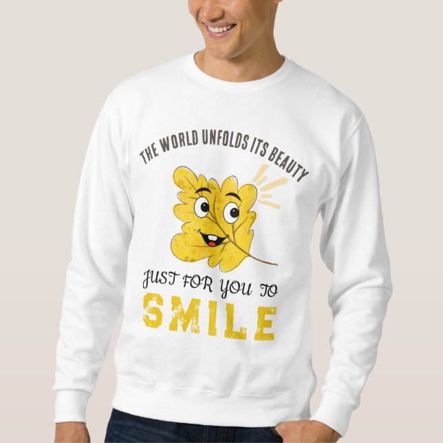 Moletom The World Unfolds Its Beauty Smiling Leaf Crewneck (Frente)