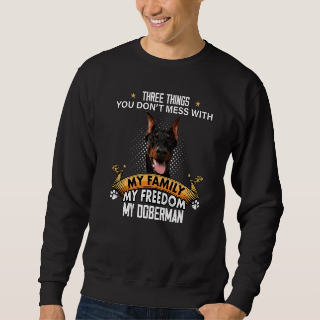 Moletom Três coisas que você não mama com o cachorro Dober (Frente)