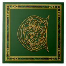 Monograma "ouro irlandês de C" em azulejos verdes