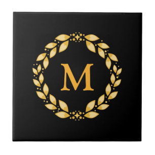 Monograma romano com folhas dourado ornamentado da