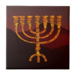 Moshe's Menorah<br><div class="desc">Uma terrível menorah de sete ramificações sobrepôs-se a um fundo montanhoso escuro. Na Torah Moshe Rabbenu, diz-se, "Você fará um Menorah de ouro puro, espancado, se o Menorah for feito, sua base, seu galho, suas bolas, seus botões, e suas flores serão martelados dele, " [Shmot 25:31] e mais tarde, "Veja,...</div>