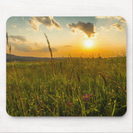 Mouse pad com pôr do sol em montanhas