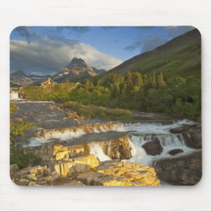 Mousepad A luz da manhã saúda Swiftcurrent Falls no