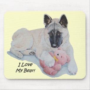 Mousepad akita mascarada negra com um cão fofo de brinquedo