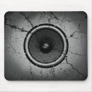 Mousepad Auto-falante de música numa parede rachada