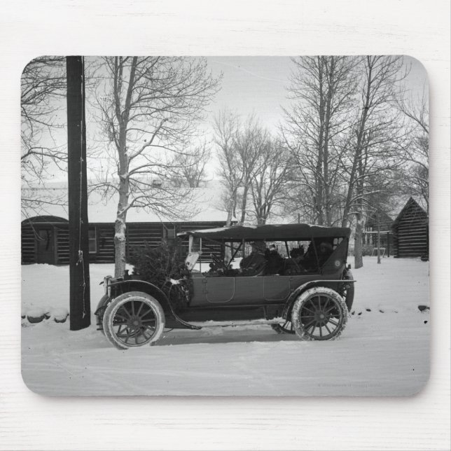 Mousepad Carro com a árvore de Natal amarrada na capa (Frente)