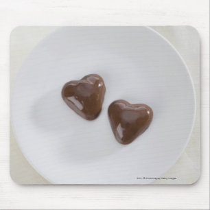 Mousepad Doces de chocolate dados forma coração em uma