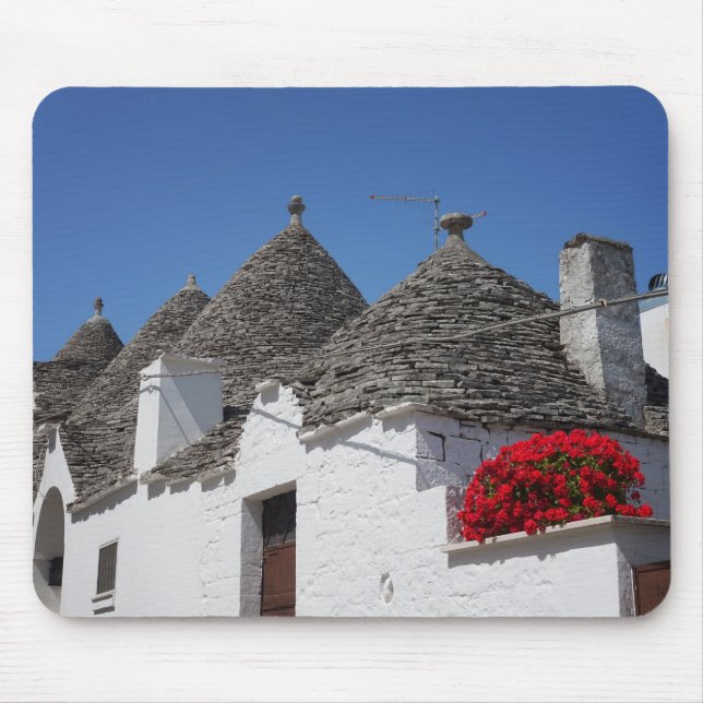 Mousepad Flores do gerânio e casas do trulli em Alberobello (Frente)