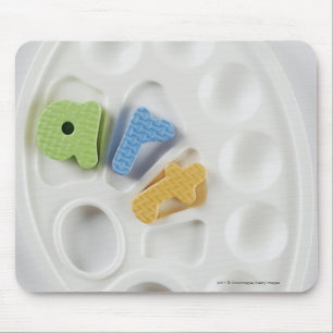 Mousepad Ideia de ângulo alto dos alfabetos em uma paleta