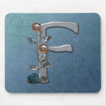 O metal floresce o monograma F