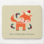 Mousepad Orange Fox In Santa Hat Cute Whimsical Christmas<br><div class="desc">A charming christmas mouepad with a retro flair. An illustration of a cute orange fox, wearing a red santa hat surrounded by christmas holly decorations. A sweet little festive forest animal. Set on a neutral toned tan background. Text says: Have A Holly Jolly Christmas, and can easily be changed /...</div>
