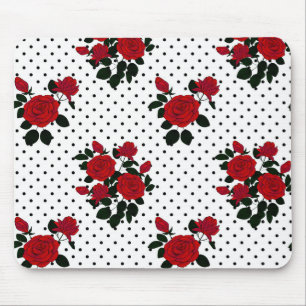 Mousepad Rosas vermelhas sobre um fundo de bolinhas.