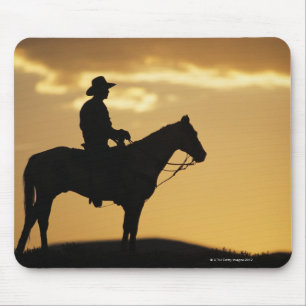 Mousepad Silhueta do vaqueiro a cavalo no por do sol ou