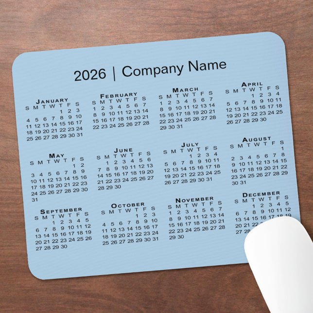 Mousepad Simples nome da empresa do calendário 2026 no Ligh (Simple 2026 Calendar Company Name on Light Blue Mouse Pad, in situ)