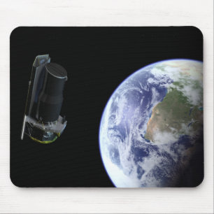Mousepad Spitzer que parte a terra logo após o lançamento