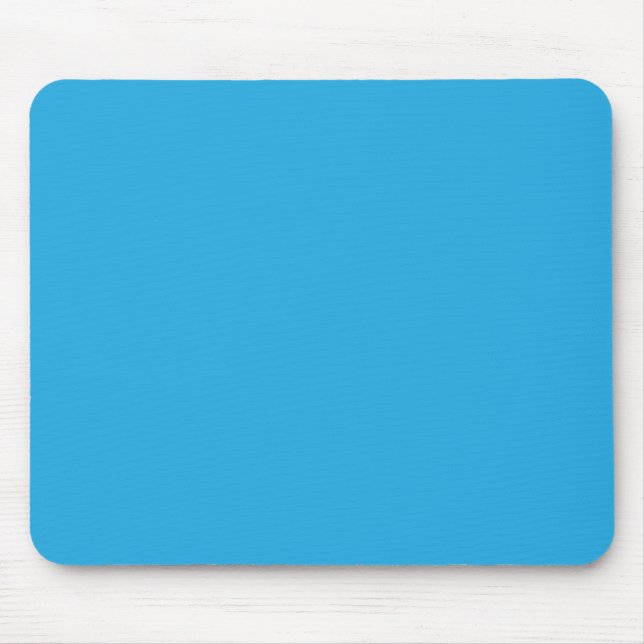 Mousepad um fundo azul com um gato preto e branco (Frente)