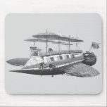 Mousepad Vintage Science Fiction Steampunk Airship Eclipse<br><div class="desc">Ilustração Vintage preto e branco da ficção científica vitoriana viagem futurista e imagem de punk a vapor de transporte. Um dirigível com asas, hélice e guarda-chuva como copas que ajudam o navio a flutuar no ar. O capitão está na casa do leme onde aparece o nome do avião, o Eclipse....</div>