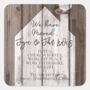 Mudança da casa de madeira das etiquetas de