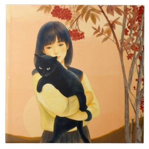 Mulher segurando um gato preto no outono