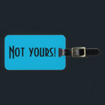 Não Sua Etiqueta De Bagagem<br><div class="desc">Esta etiqueta de bagagem não é sua é uma maneira inteligente de dizer às pessoas do carrossel de bagagem para continuar procurando. Ele apresenta um fundo azul vibrante e uma letra preta e ousada que diz,  "Não é seu!" O lado oposto está pronto para a personalização.</div>