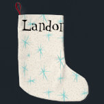 Natal Pequena Meia do X-Mas de Starbursts de turquesa da era<br><div class="desc">Das características customizáveis deste os starbursts azuis teste padrão da meia do Natal de Starbursts de turquesa da era espacial em um fundo cremoso com o ouro colorido salpicam. Inspirado por um teste padrão moderno do prato do meio século clássico, este design tem um dom autêntico do vintage. Os bens...</div>