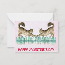 Dois gatos num cartão de namorados de cerca