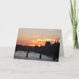 Notas Paris no cartão de vazio do pôr do sol
